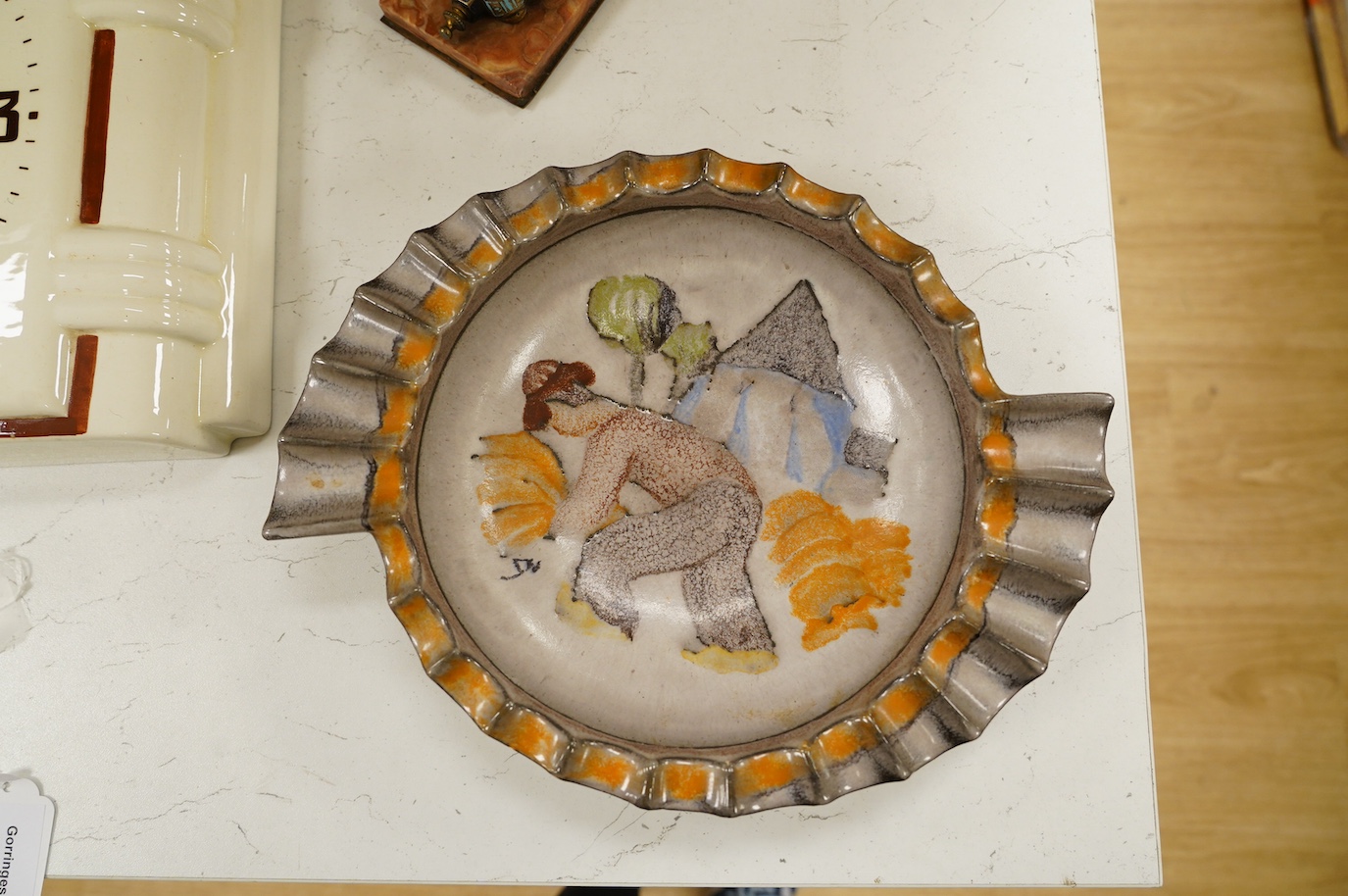 An Art Deco Michael Andersen, Denmark ‘farming’ dish, 27.5cm diameter. Condition - good